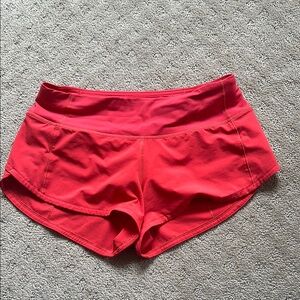 Red/Coral Lululemon 2.5 inch Speed Up shorts